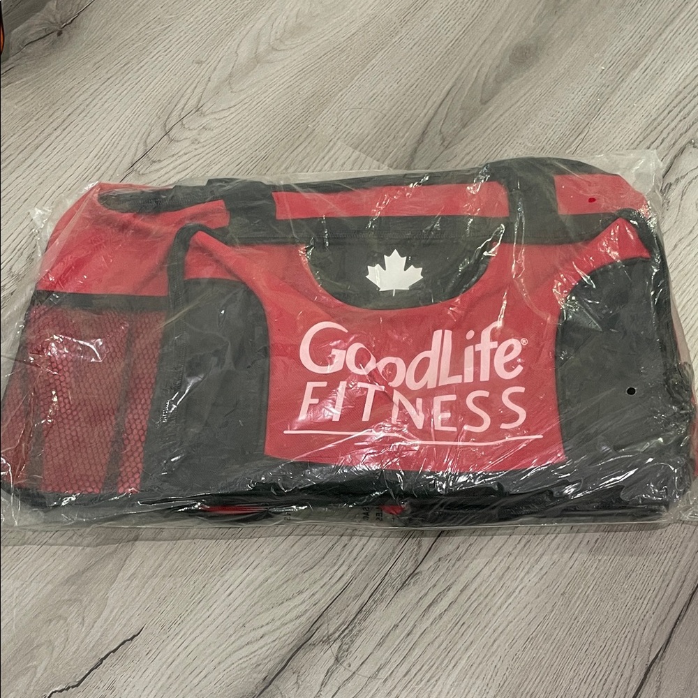 GoodLife Fitness Red and Black Travel Duffel with Maple Logo